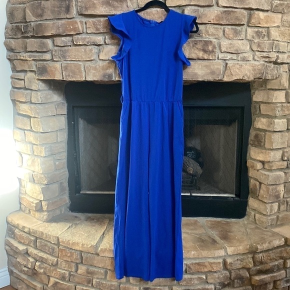 NWT BTFBM Royal blue jumpsuit with pockets. Size Medium.